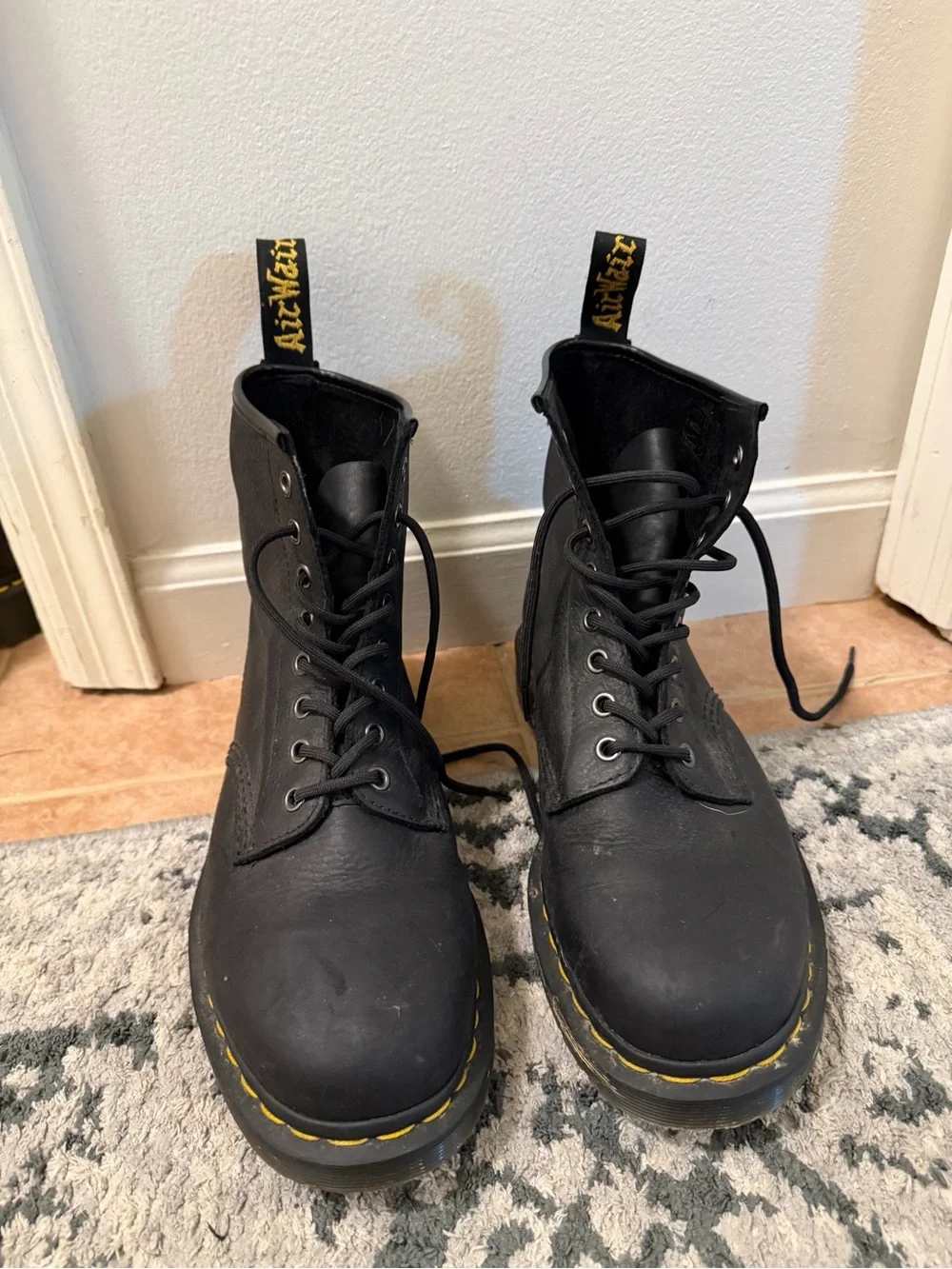 Dr. Martens Black Leather 8-Eye Lace-Up Boots with Yellow Stitching